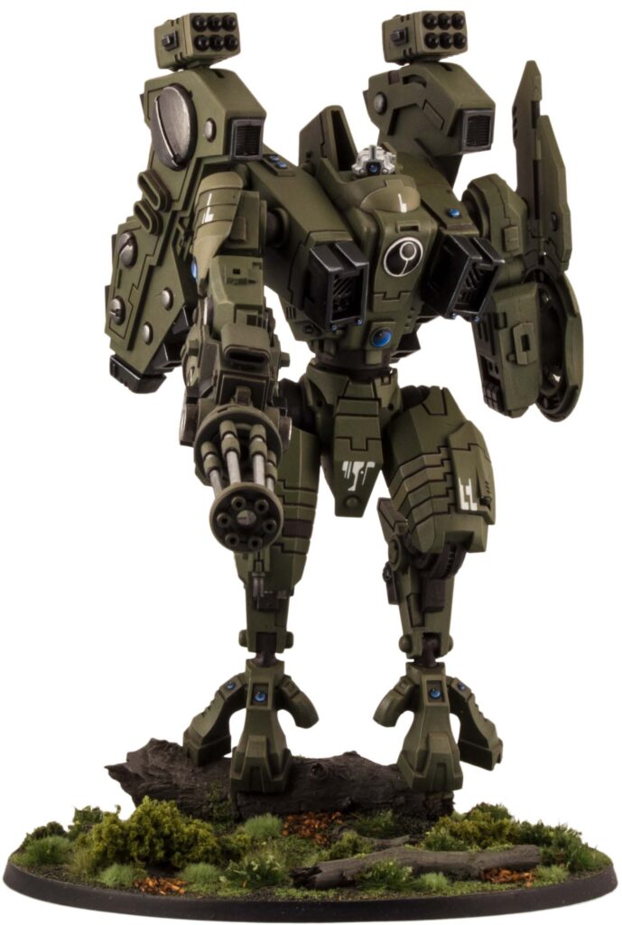 A Painted Tau Riptide model, painted in a green forest theme.
